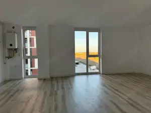 Apartament cu 2 camere si centrala proprie, la Campeador City