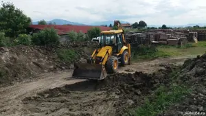Închiriat Buldoexcavator