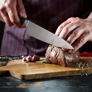 Cutitul bucatarului cu lama din otel Damasc