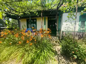 Căsuță cu istorie ideală pentru iubitorii de autentic - imagine 4