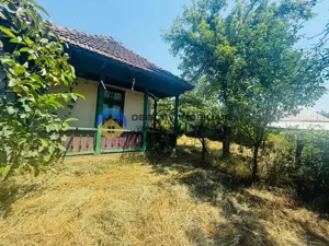 Căsuță cu istorie ideală pentru iubitorii de autentic - imagine 5