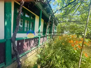 Căsuță cu istorie ideală pentru iubitorii de autentic - imagine 3