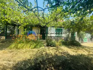 Căsuță cu istorie ideală pentru iubitorii de autentic