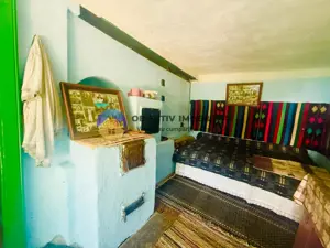 Căsuță cu istorie ideală pentru iubitorii de autentic - imagine 10