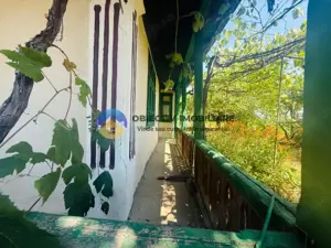 Căsuță cu istorie ideală pentru iubitorii de autentic - imagine 2