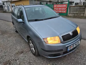 SKODA FABIA Combi, 1.2 HTP benzina, numai 84000km, an 2006 - imagine 5