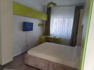 Închiriez apartament în Tractorul  - imagine 9