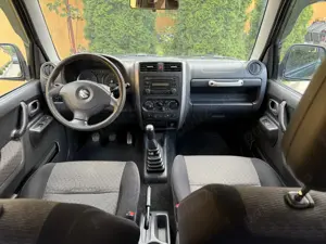 Suzuki Jimny 1.3 benzina 4x4 - imagine 8