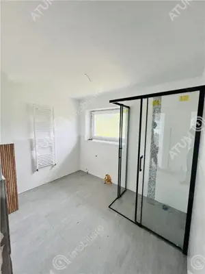 Casa individuala in Cisnadioara cu 4 camere 2 bai terasa teren 1170 mp - imagine 8