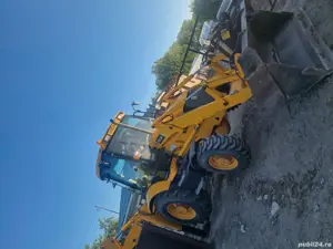 Prestări servicii buldoexcavator 