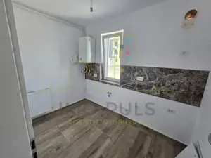 Apartament la parter cu balcon. Bucatarie separata. Loc de parcare - imagine 2