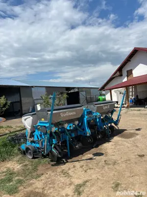 Semanatoare de porumb cu calculator