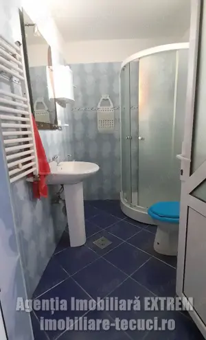 Casa de cărămidă cu 6 camere în Tecuci, 300mp teren în zona podului Bălcescu - imagine 12