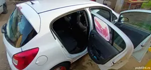 Opel Corsa D 1.4 - imagine 6