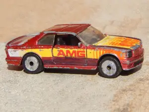 Macheta Mercedes-Benz 500 SEC AMG 1984 Matchbox 1:64 Macao uzat