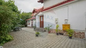 Casa 7 camere,  curte si terasa, situata in centrul Sanpetrului!