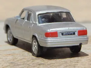 Macheta GAZ Volga 31105 2004 argintie sc 1:60 cu cutie - imagine 3