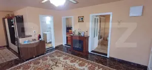 Casă individuală de vânzare – zonă liniștită, teren generos 1800 mp - imagine 2