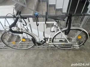 Bicicletă cursieră Condor+husă silicon șa, husă bicicletă și geantă specială. 