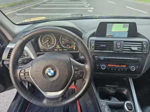 BMW F20 Seria 1 120D*184cp*Xdrive*Piele*Trapa*Xenon*Senzori F S*Full - imagine 7 BMW F20 Seria 1 120D*184cp*Xdrive*Piele*Trapa*Xenon*Senzori F S*Full - imagine 7