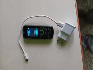 Telefon Dalas cu incarcator