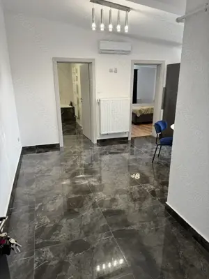 vand apartament cu 3 camere, finisat, in bloc nou - imagine 2