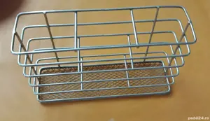 O piesă din inox cu sită nu stiu numele 