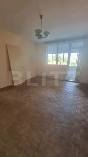 Apartament cu 2 camere, etaj intermediar, zonă verde, ideal pentru investitie