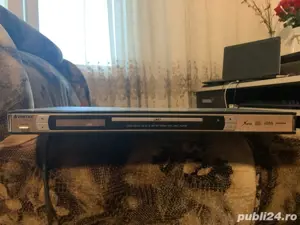 Vand DVD impreuna cu 15 CD-uri desene animate.