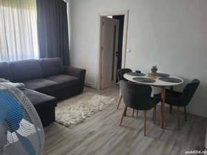 Închiriez apartament în regim hotelier  - imagine 2 Închiriez apartament în regim hotelier  - imagine 2