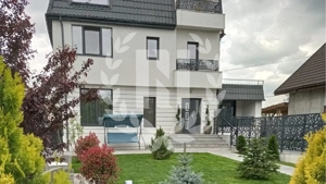 Apartament 4 camere cu terasă și curte generoasă - imagine 2