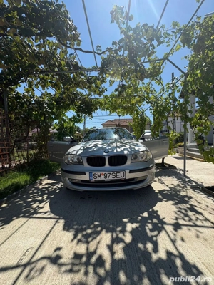 Bmw 116i 2009 - imagine 8