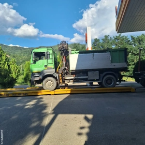 Man 4x4 basculabil cu macara forestiera 