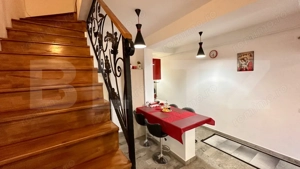 Apartament cu 3 camere și 2 băi, curte comuna, centrală pe gaz, ultracentral