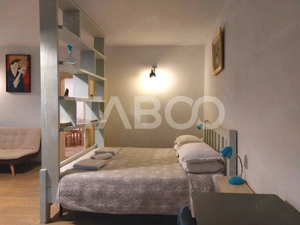 Studio de inchiriat la casa camera bucatarie baie langa Lidl Cisnadie - imagine 2 Studio de inchiriat la casa camera bucatarie baie langa Lidl Cisnadie - imagine 2