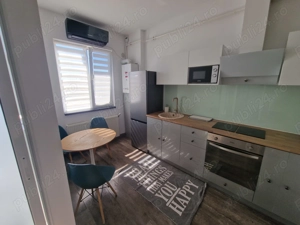 Inchiriez apartament regim hotelier 70 m2 open space , zona Barierei - imagine 2