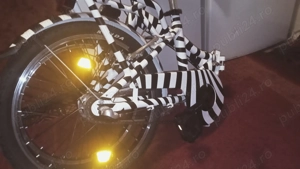 vind bicicleta pliabila in stare noua folosita de citeva ori. modelul de zebra este de la producator