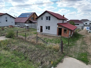 Casa la gri in Frumuseni - imagine 2 Casa la gri in Frumuseni - imagine 2