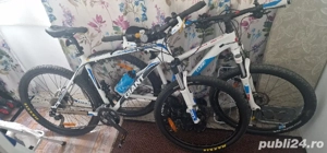 Bicicleta Giant echipare top