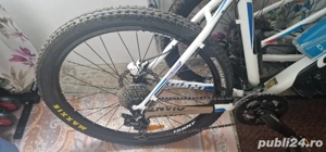 Bicicleta Giant echipare top - imagine 4