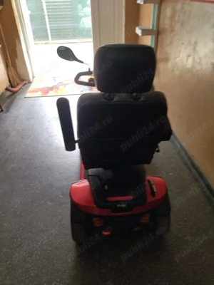 Carut [ scuter] electric  pentru persoane cu dizabilitati