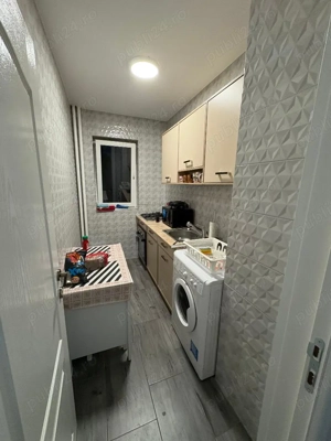 Închiriez garsonieră confort I în zona Pieței Râmnicu Sărat - imagine 8