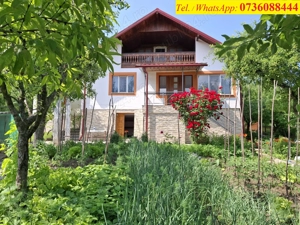 Casa 5 camere, util 122 mp, beci, garaj. 1.200 mp intravilan cu livada