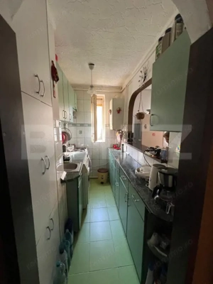 Apartament cu 3 camere în zona Rovinari | spațiu luminos & confort - imagine 2