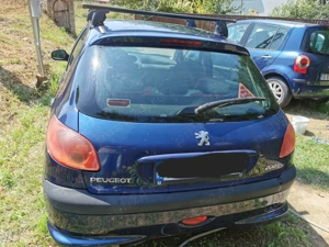 Persoană fizică vând Peugeot 206