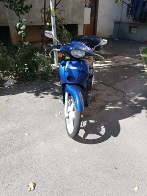 Vând scuter Aprilia Scarabeo  - imagine 5 Vând scuter Aprilia Scarabeo  - imagine 5