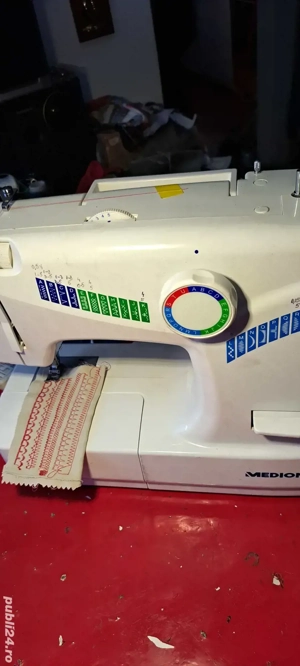  vînd mașina de cusut 