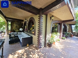 Vilă de lux Otopeni, pentru colecționari, înconjurată de brazi și artă - imagine 3