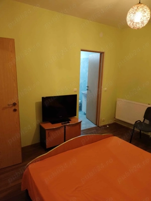Închiriez locuință formata din 2 camere situata la parterul unui bloc. - imagine 4 Închiriez locuință formata din 2 camere situata la parterul unui bloc. - imagine 4