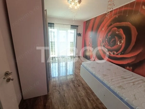 Apartament 2 camere 62 mpu balcon de 21 mp si pod de vanzare Selimbar - imagine 10 Apartament 2 camere 62 mpu balcon de 21 mp si pod de vanzare Selimbar - imagine 10